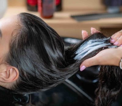 jpeg-optimizer_in-a-salon-setting-a-stylist-delicately-applies-c-2024-03-18-00-58-33-utc